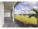 Covered patio overlooking the lake and community at 1217 Blue Shell Loop, Sarasota, FL 34240