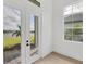 Home office with French doors leading to backyard at 1217 Blue Shell Loop, Sarasota, FL 34240
