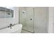 Spa-like bathroom with soaking tub and walk-in shower at 1217 Blue Shell Loop, Sarasota, FL 34240