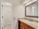 Bathroom features an granite-topped vanity and an adjoining bathroom at 6384 Draw Ln # 38, Sarasota, FL 34238