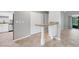 Bright kitchen featuring granite countertops and tile flooring at 6384 Draw Ln # 38, Sarasota, FL 34238