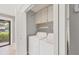 Laundry closet featuring a washer and dryer at 6384 Draw Ln # 38, Sarasota, FL 34238