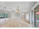 Spacious living room with tile floors, vaulted ceilings and lots of natural light at 6384 Draw Ln # 38, Sarasota, FL 34238
