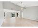Bright living room with high ceilings and tile flooring at 6384 Draw Ln # 38, Sarasota, FL 34238