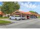 Open parking area with covered spaces to protect vehicles from weather at 6384 Draw Ln # 38, Sarasota, FL 34238