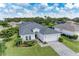 Single-story home with a large backyard and paved driveway at 12105 Goldenrod Ave, Bradenton, FL 34212