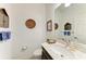 Clean bathroom with vanity, toilet and mirror at 12105 Goldenrod Ave, Bradenton, FL 34212