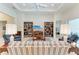 Bright living room features built-in bookshelves and comfortable seating at 12105 Goldenrod Ave, Bradenton, FL 34212