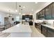 Modern kitchen with stainless steel appliances and large island at 12105 Goldenrod Ave, Bradenton, FL 34212