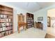 Lovely library with extensive built-in bookshelves at 12105 Goldenrod Ave, Bradenton, FL 34212