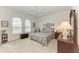 Charming bedroom with queen-size bed and ample closet space at 12105 Goldenrod Ave, Bradenton, FL 34212