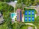 Community features pool, pickleball courts, and solar panels at 1520 Pelican Point Dr # 251, Sarasota, FL 34231