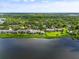 Aerial view of waterfront community with lush landscaping at 1520 Pelican Point Dr # 251, Sarasota, FL 34231