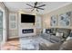 Living room featuring a fireplace and flat-screen TV at 3165 Stokie Ave, North Port, FL 34286