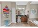 Bathroom with a vanity and a view of the backyard at 3165 Stokie Ave, North Port, FL 34286