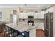 Kitchen with white cabinets, granite counters, and stainless steel appliances at 3165 Stokie Ave, North Port, FL 34286