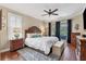 Main bedroom with king-size bed and access to the pool at 3165 Stokie Ave, North Port, FL 34286