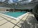Community pool with covered seating area at 3925 Oakhurst Blvd # 3010, Sarasota, FL 34233