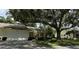 Single Gathering home exterior with attached garage at 3925 Oakhurst Blvd # 3010, Sarasota, FL 34233