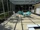 Community pool area with tables and chairs at 3925 Oakhurst Blvd # 3010, Sarasota, FL 34233