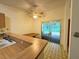 Kitchen with breakfast nook and view of the backyard patio at 3925 Oakhurst Blvd # 3010, Sarasota, FL 34233