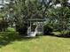 Lovely gazebo nestled in a lush green space at 3925 Oakhurst Blvd # 3010, Sarasota, FL 34233