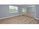 Bedroom with mirrored closet and window at 13592 Clara Ln, Port Charlotte, FL 33981
