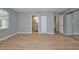 Bedroom with bathroom access and mirrored closet at 13592 Clara Ln, Port Charlotte, FL 33981