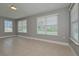 Sunroom with tile floor and multiple windows at 13592 Clara Ln, Port Charlotte, FL 33981