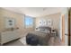 Comfortable bedroom with serene ocean view, soft textures, and stylish nautical accents for a relaxing retreat at 1945 Gulf Of Mexico Dr # M2-310, Longboat Key, FL 34228