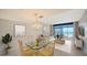 Bright and inviting living room featuring stunning ocean views, elegant decor, and a relaxing atmosphere at 1945 Gulf Of Mexico Dr # M2-310, Longboat Key, FL 34228