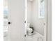 Small bathroom with toilet and marble flooring at 332 Mccabe St, Port Charlotte, FL 33953