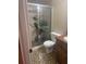 Main bathroom with walk-in shower and updated fixtures at 411 Briarwood Rd, Venice, FL 34293