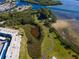 Aerial view of waterfront property with lush landscaping at 4819 Independence Dr # 4819, Bradenton, FL 34210