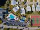 Community overview showing pool, tennis court, and homes at 4819 Independence Dr # 4819, Bradenton, FL 34210