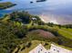 Aerial view of waterfront property with walking paths at 4819 Independence Dr # 4819, Bradenton, FL 34210