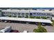 Aerial view showcasing condo building and parking at 4819 Independence Dr # 4819, Bradenton, FL 34210