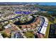 Aerial view of community with boat docks and tennis court at 4819 Independence Dr # 4819, Bradenton, FL 34210