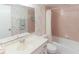 Bathroom with tub and floral wallpaper at 4819 Independence Dr # 4819, Bradenton, FL 34210