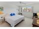 King-size bed in bright bedroom with water view at 4819 Independence Dr # 4819, Bradenton, FL 34210