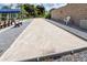Community bocce ball court with benches and surrounding landscaping at 4819 Independence Dr # 4819, Bradenton, FL 34210