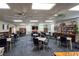 Spacious community room with tables and chairs at 4819 Independence Dr # 4819, Bradenton, FL 34210