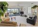 Living room with access to lanai and water view at 4819 Independence Dr # 4819, Bradenton, FL 34210