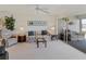 Living room with sofa, chairs and access to lanai at 4819 Independence Dr # 4819, Bradenton, FL 34210
