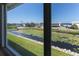Scenic water view with lush vegetation and residential buildings at 4819 Independence Dr # 4819, Bradenton, FL 34210