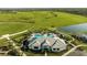 Aerial view of community with pool and clubhouse at 6112 Mesa Gln, Bradenton, FL 34203