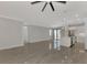 Open concept living area with kitchen and access to patio at 906 E Venice Ave, Venice, FL 34285
