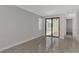Spacious bedroom with sliding glass doors leading to a patio at 906 E Venice Ave, Venice, FL 34285