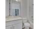 Modern bathroom with white vanity and bathtub at 906 E Venice Ave, Venice, FL 34285