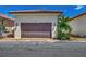 Double-car garage with paver driveway at 906 E Venice Ave, Venice, FL 34285